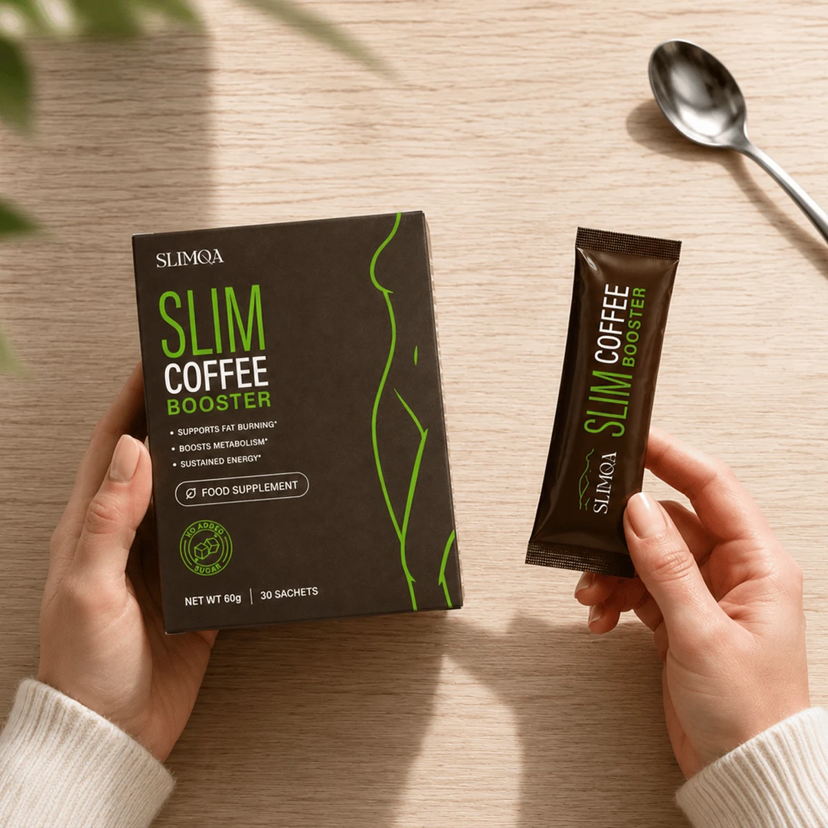 Boîte de Slimqa Slim Coffee Booster à côté d’un stick individuel de 2 g